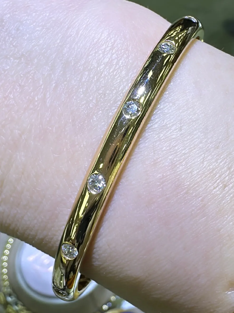 0.54ct tw Burnish Set Diamond Station Bangle Bracelet