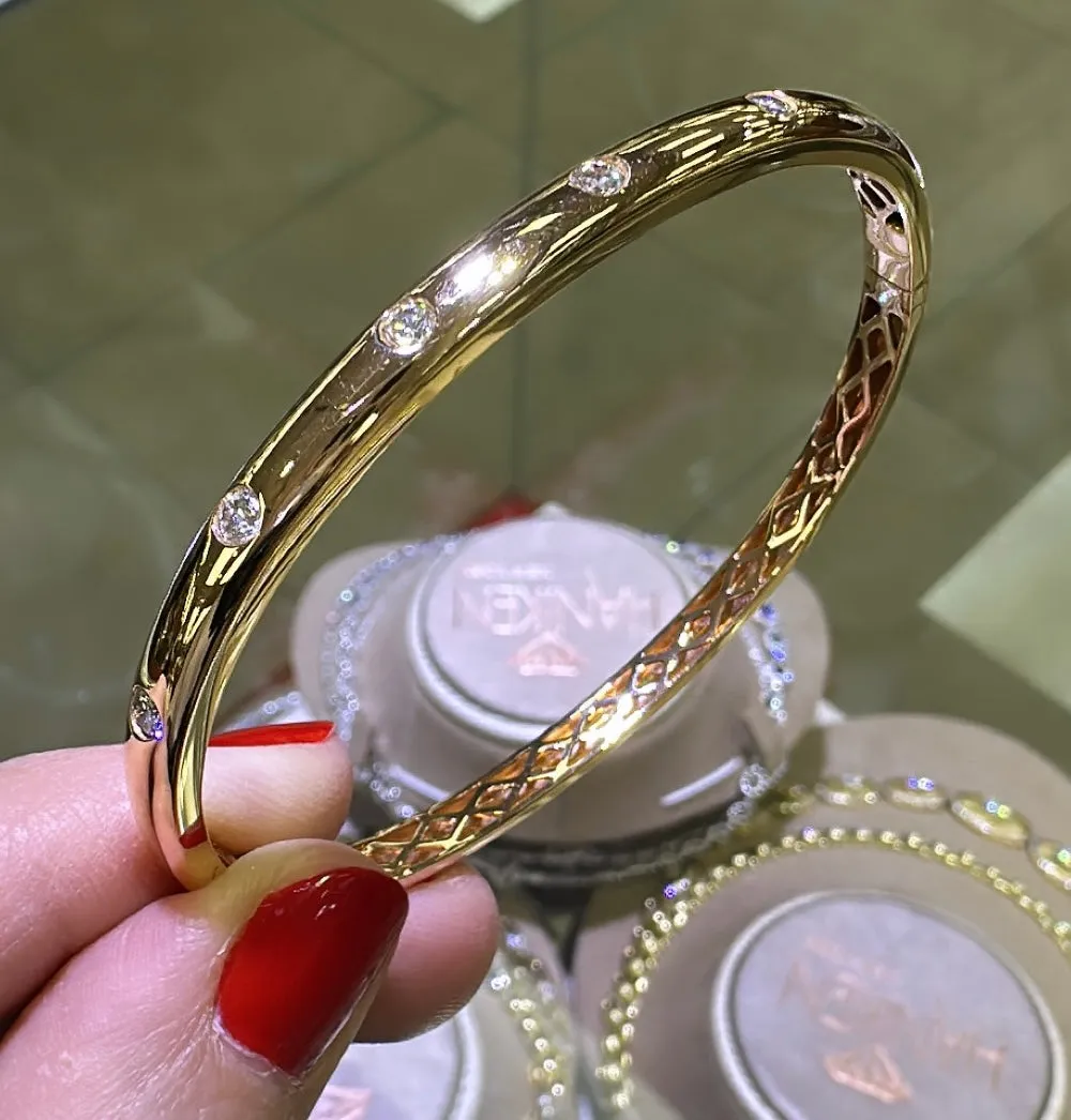 0.54ct tw Burnish Set Diamond Station Bangle Bracelet