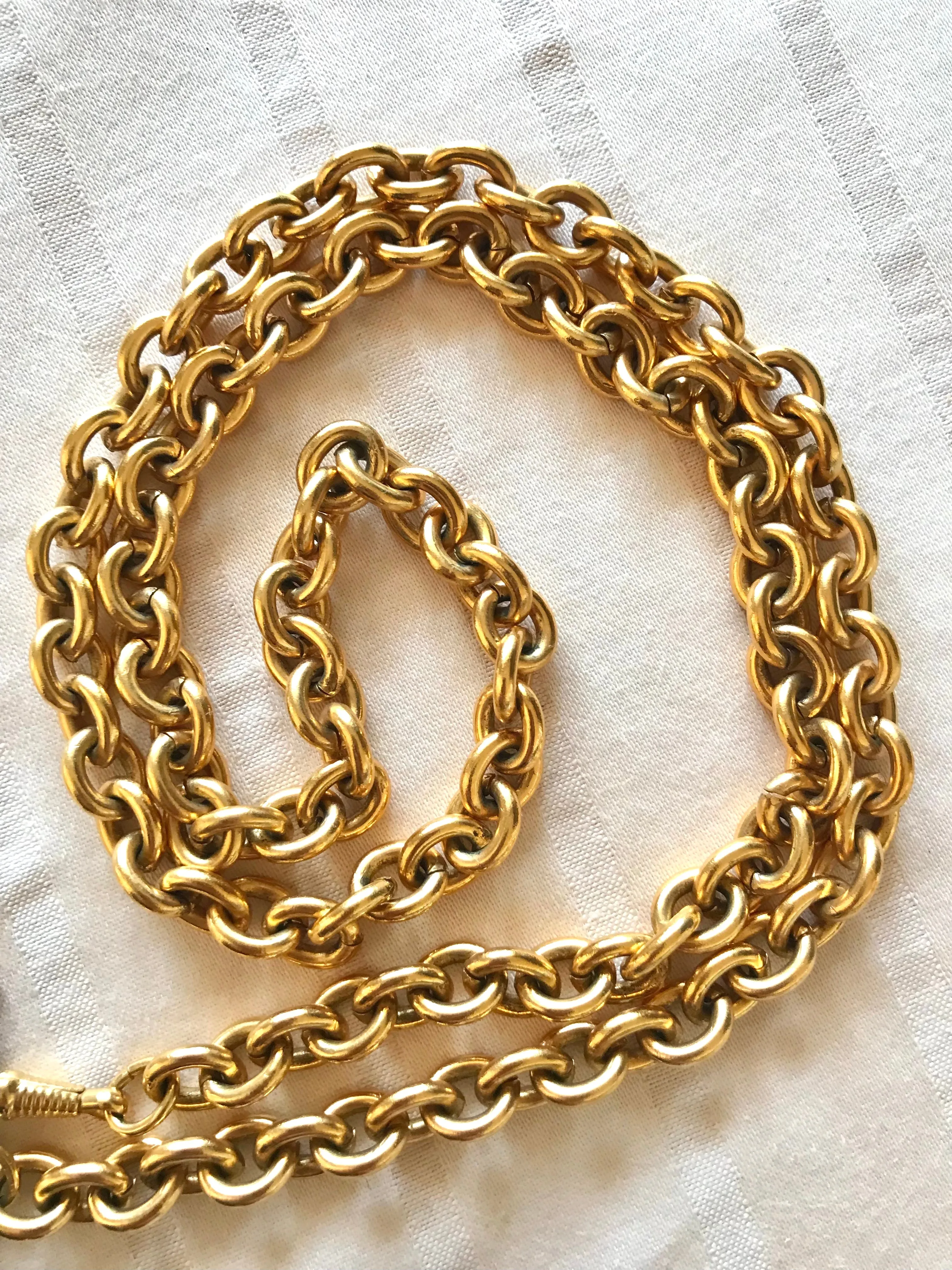 1990s. Vintage CHANEL long chain necklace with extra large matelasse CC mark pendant top.  Can be worn in double.  Gorgeous and classic jewelry piece.