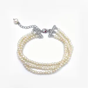 223-01-S | VINTAGE TRIPLE STRAND BRACELET (WHITE/SILVER)
