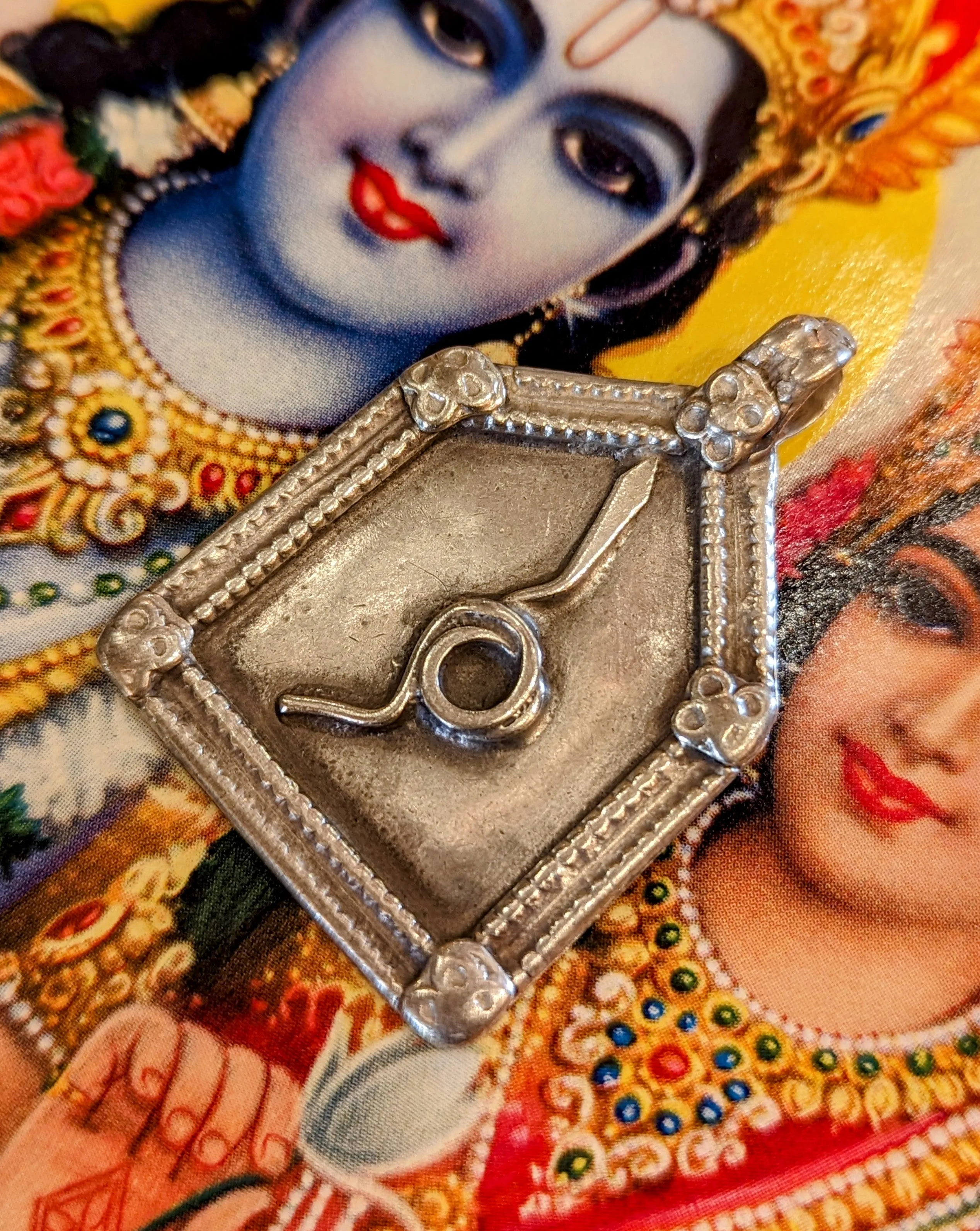 Antique silver serpent pendants