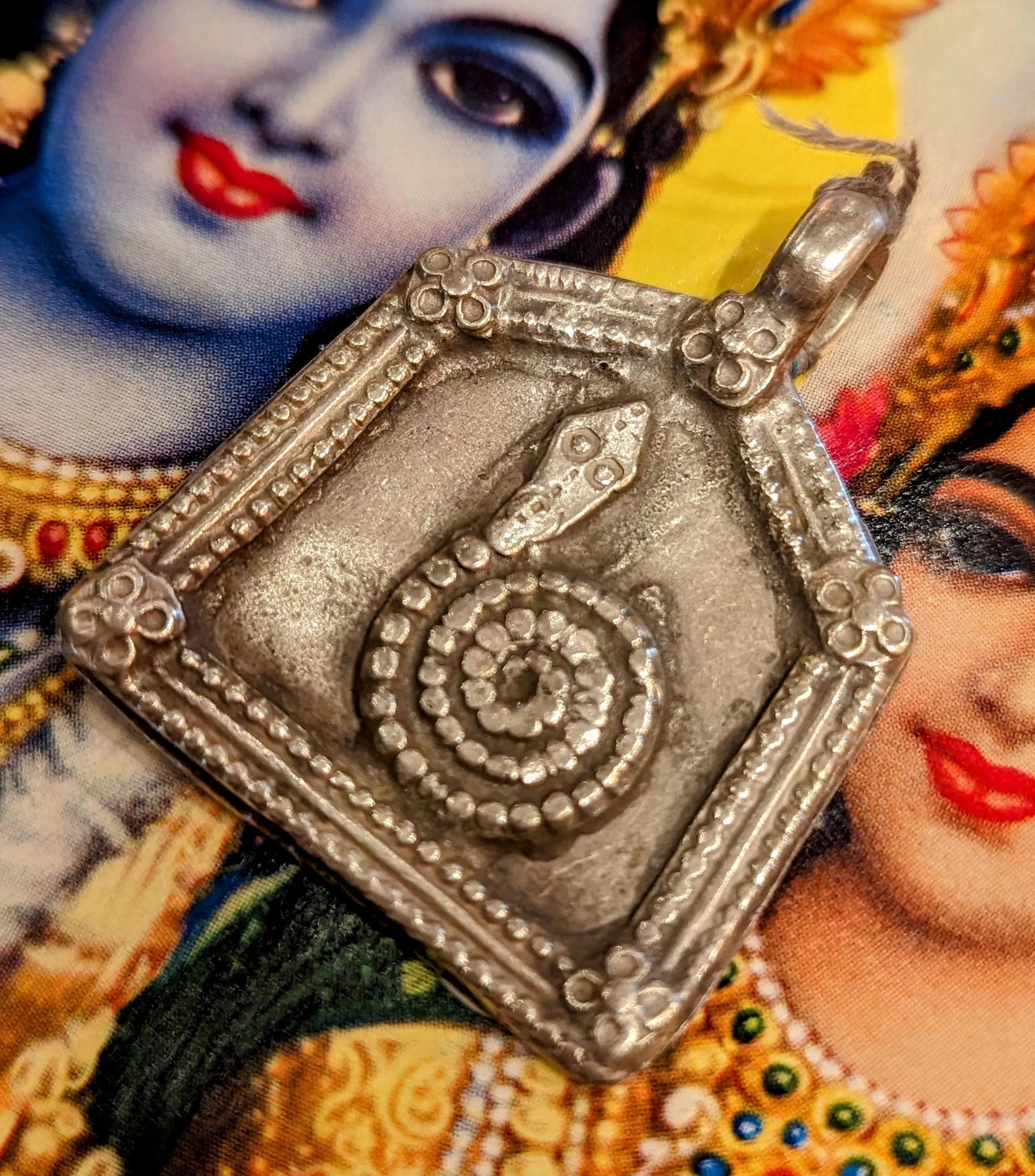 Antique silver serpent pendants