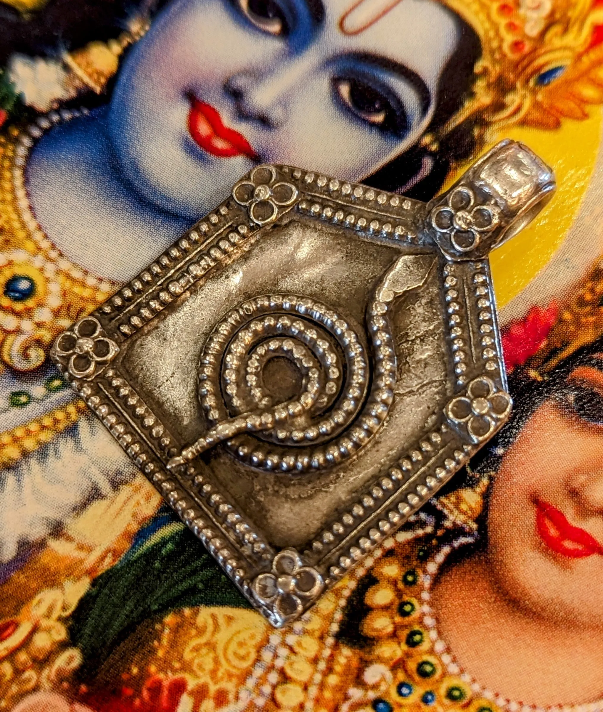 Antique silver serpent pendants