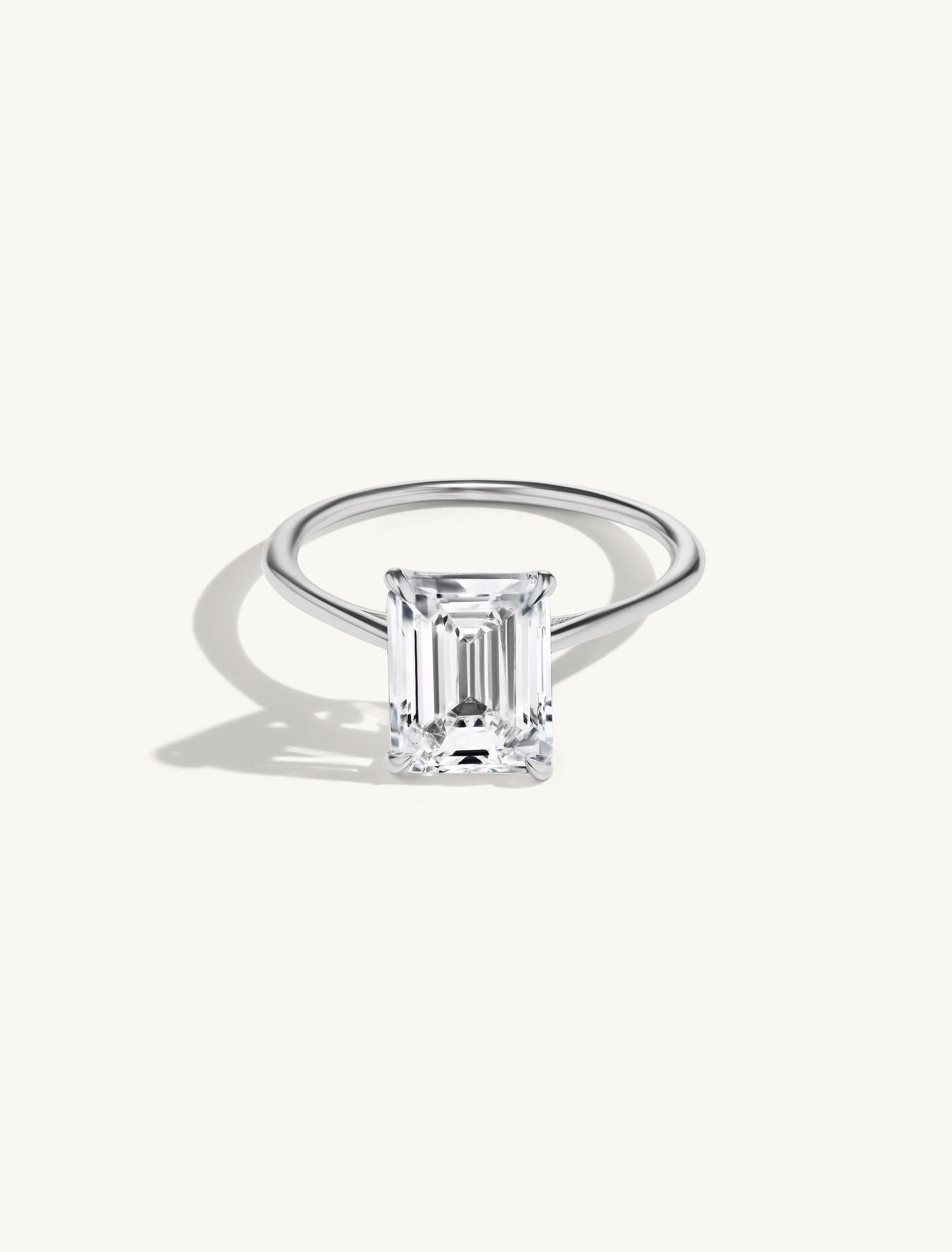 Floating Emerald Engagement Ring