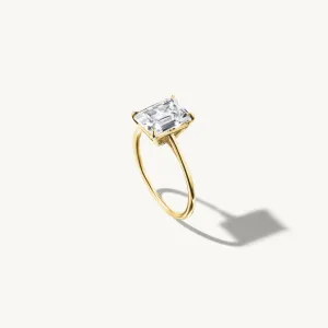 Floating Emerald Engagement Ring