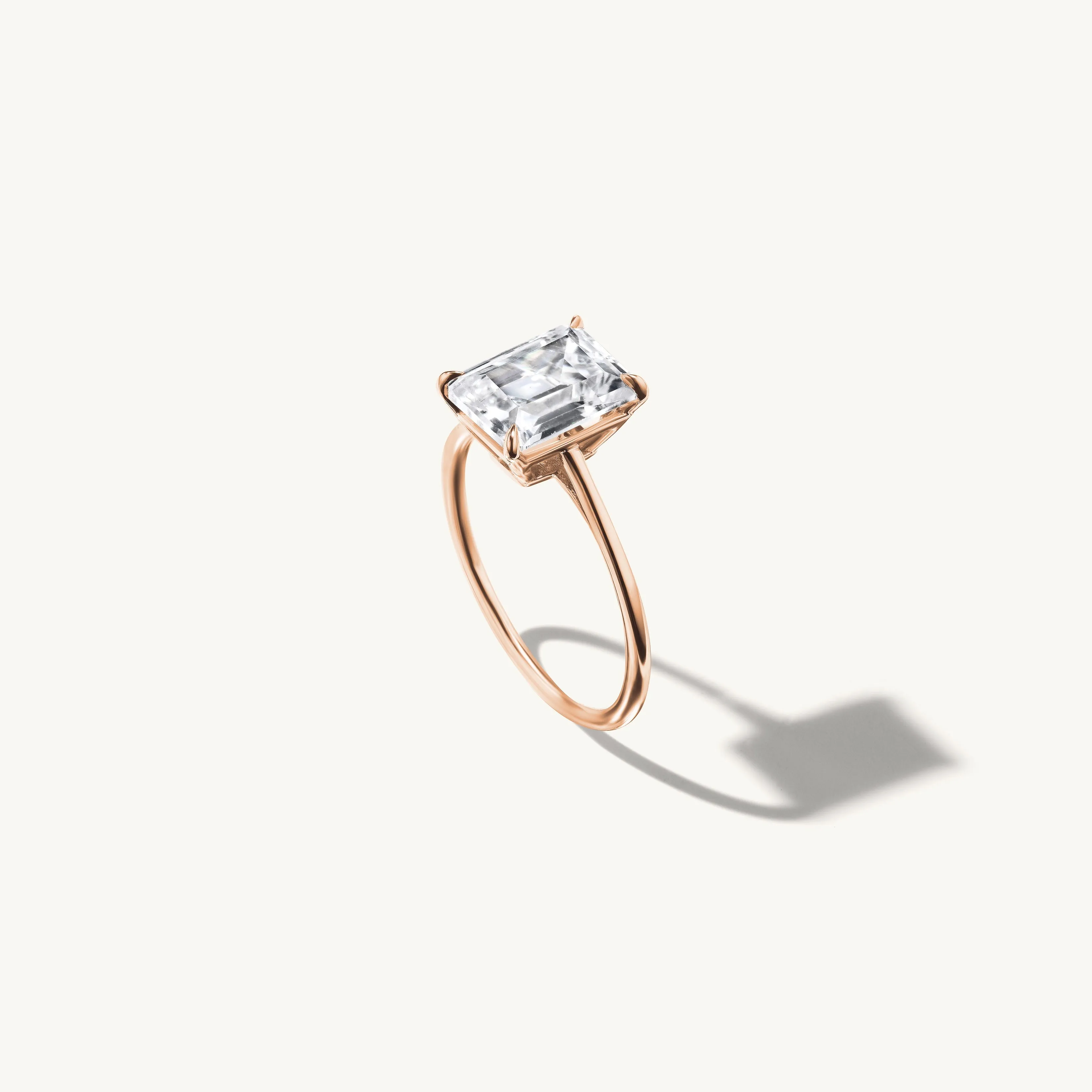 Floating Emerald Engagement Ring