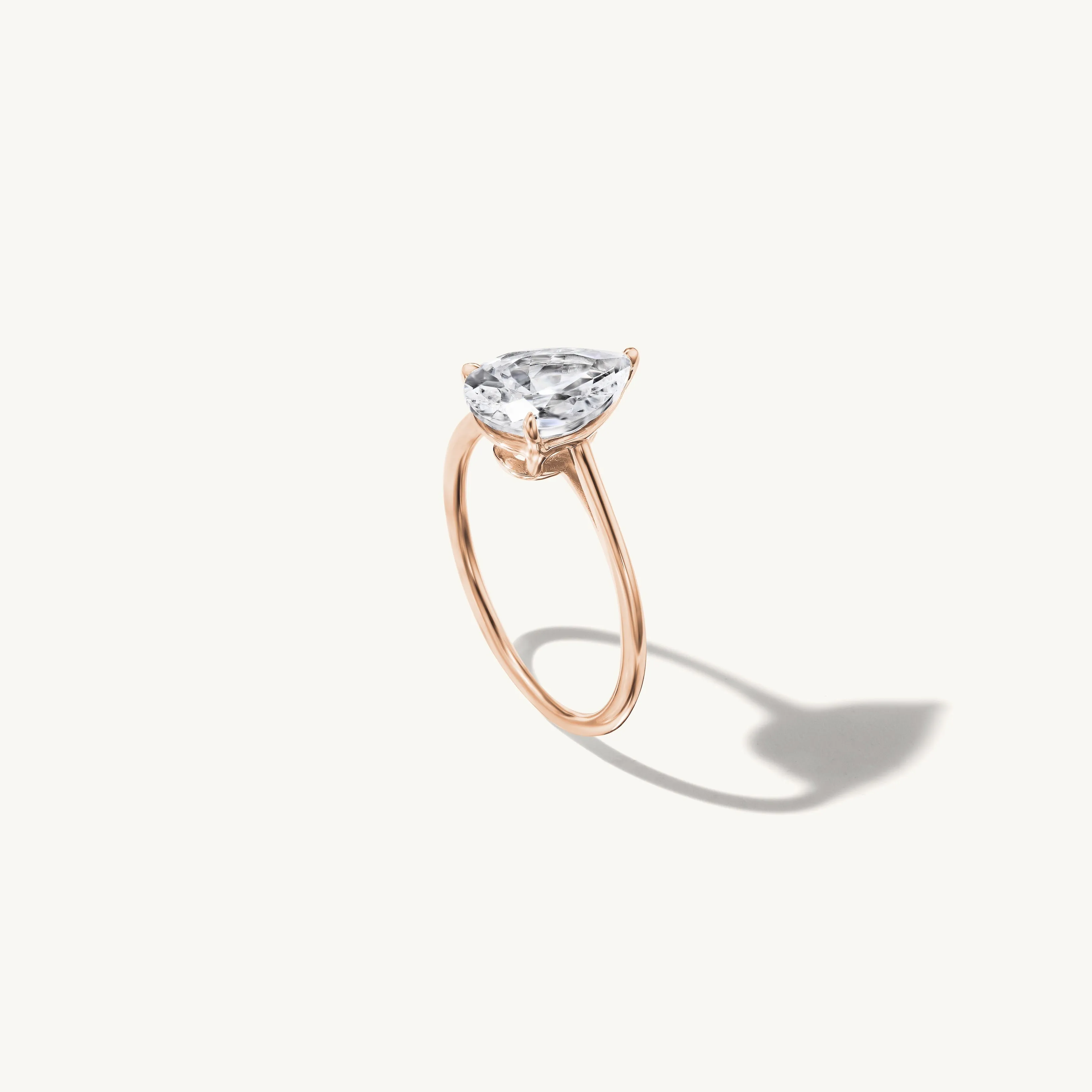 Floating Pear Engagement Ring