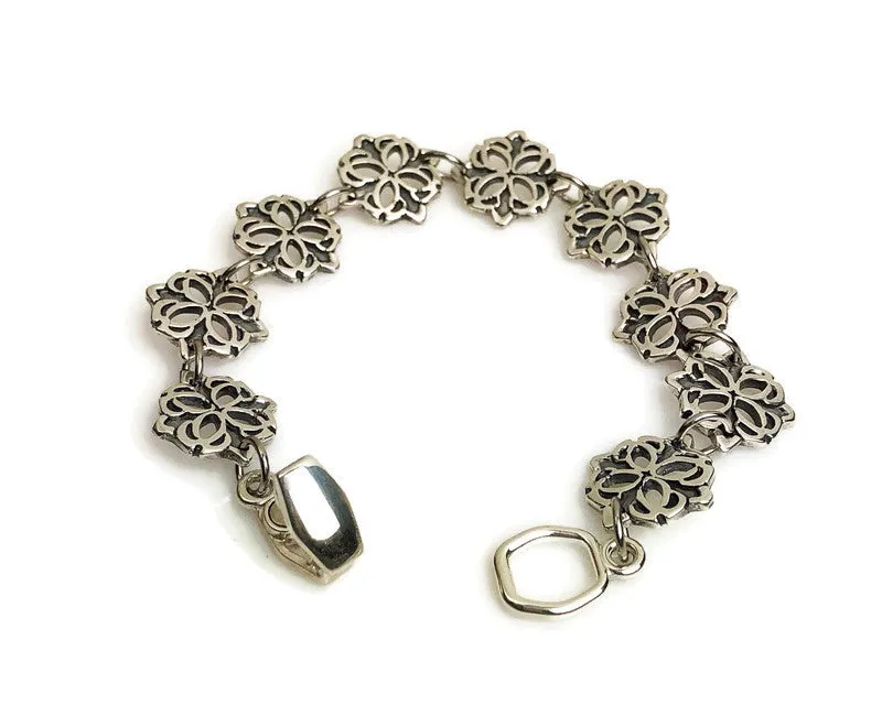 Medallion Carved Silver Bracelet