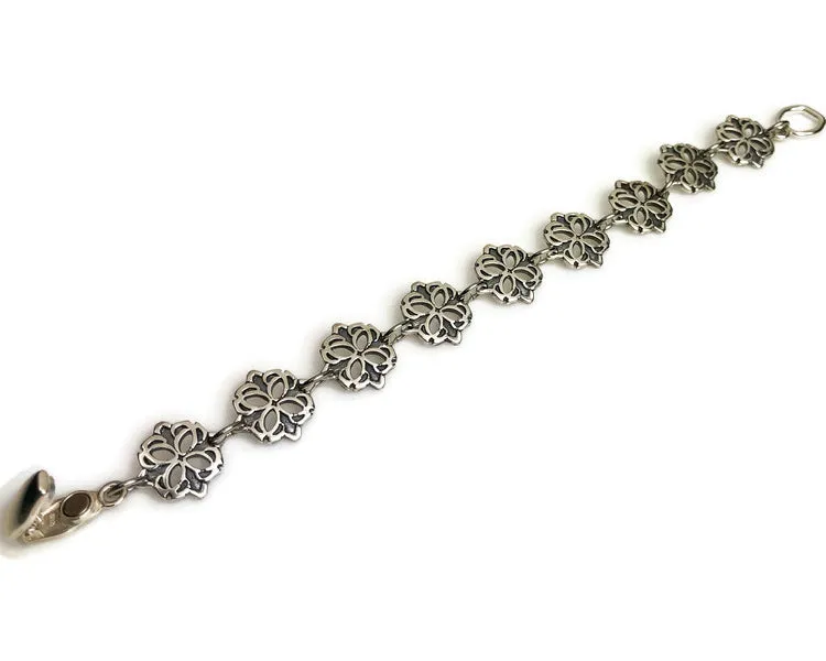 Medallion Carved Silver Bracelet