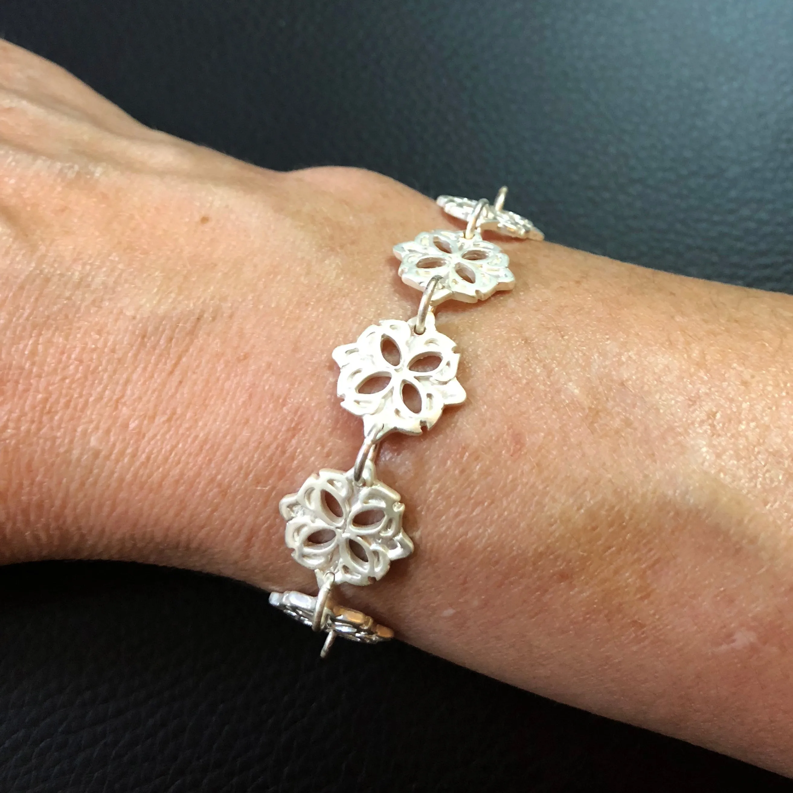 Medallion Carved Silver Bracelet