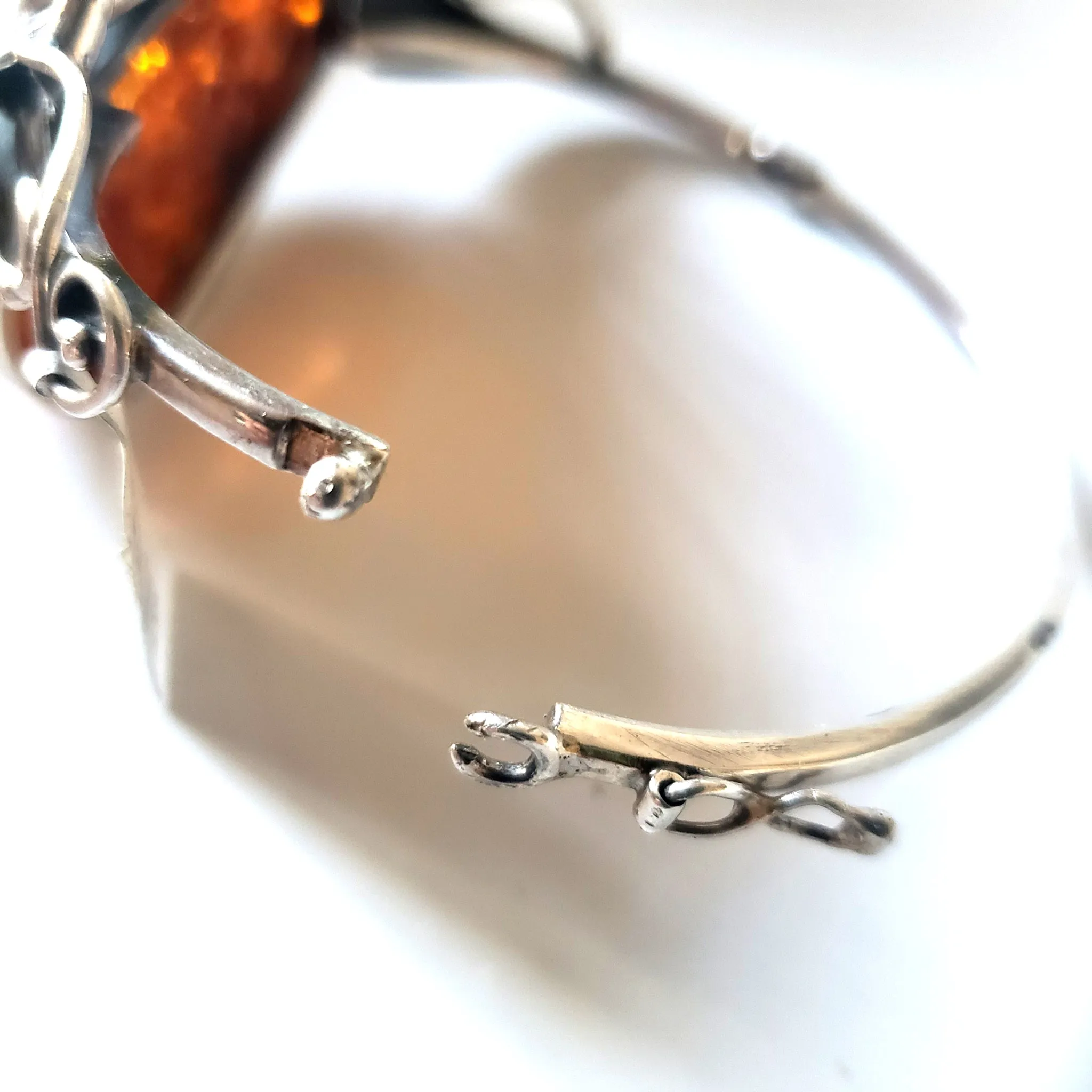 Oval Amber Bungle Silver Bracelet