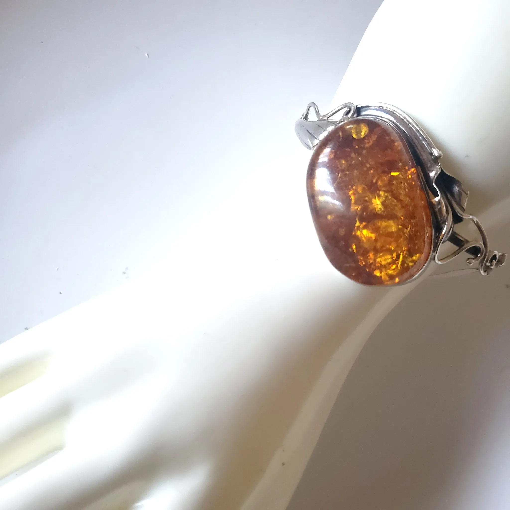 Oval Amber Bungle Silver Bracelet