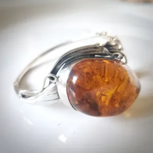Oval Amber Bungle Silver Bracelet