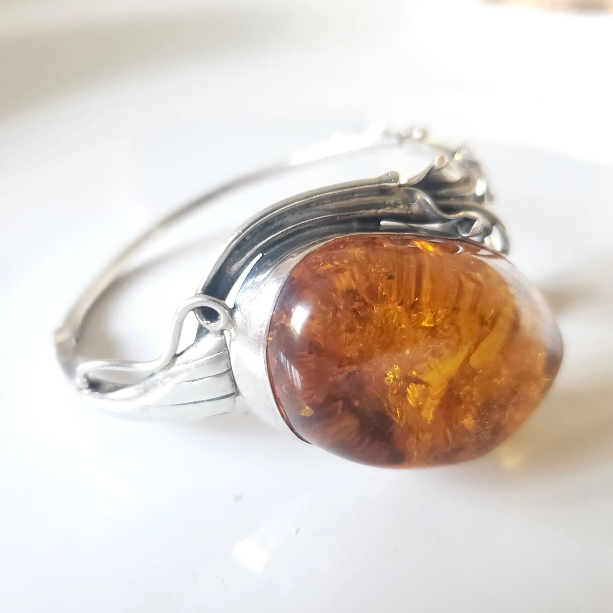 Oval Amber Bungle Silver Bracelet