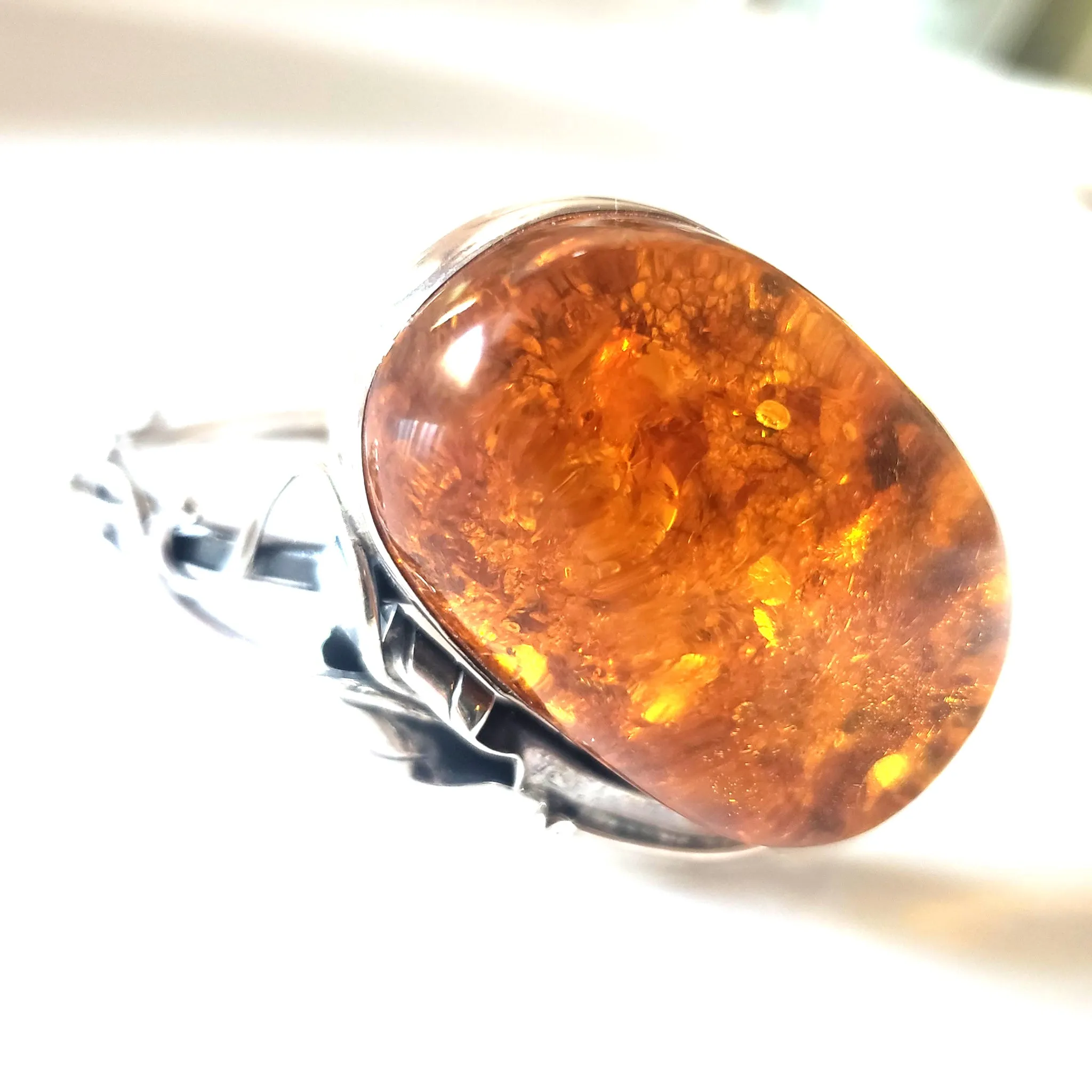 Oval Amber Bungle Silver Bracelet