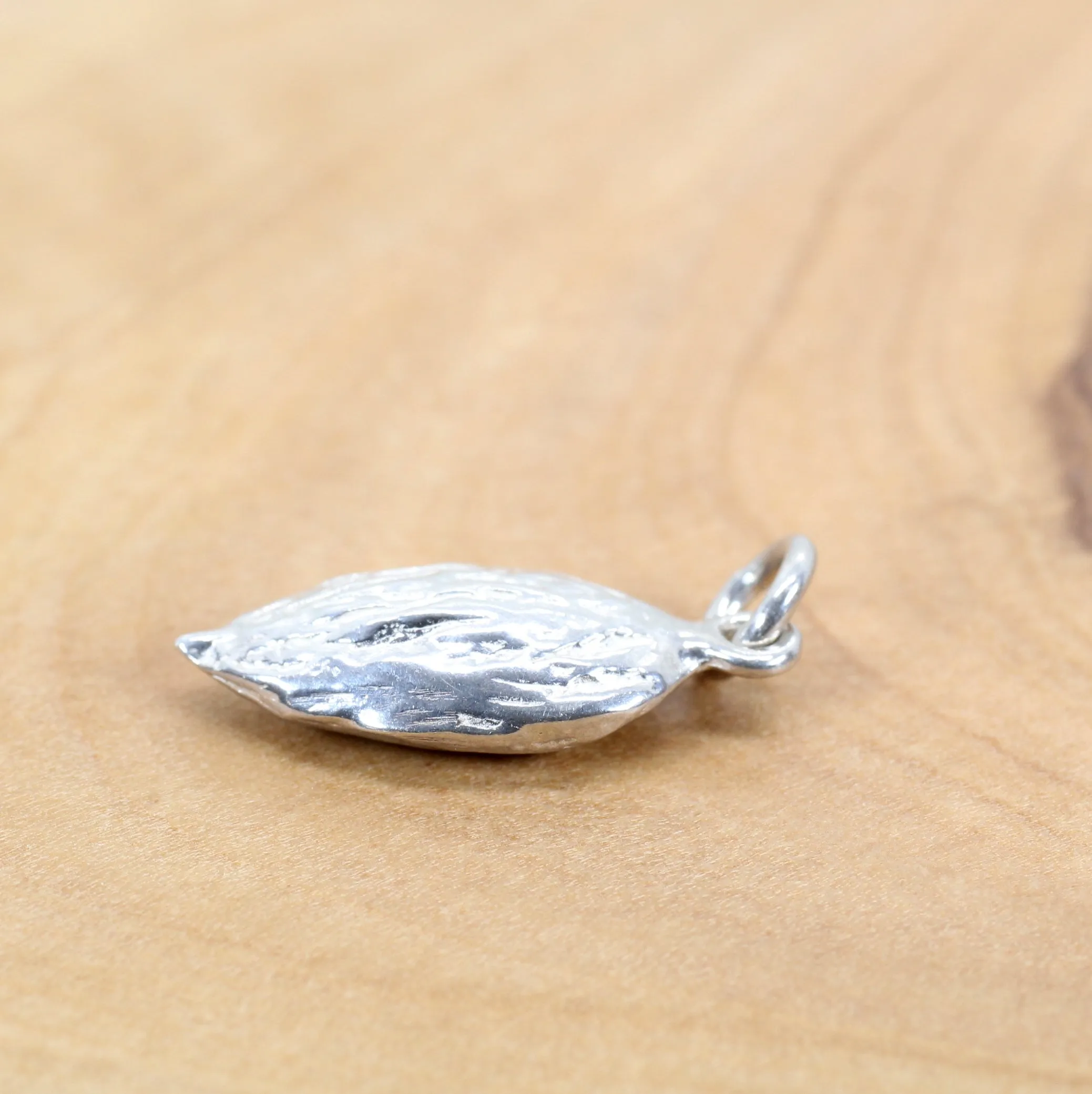 Silver Almond Charm in smaller size for her bracelet