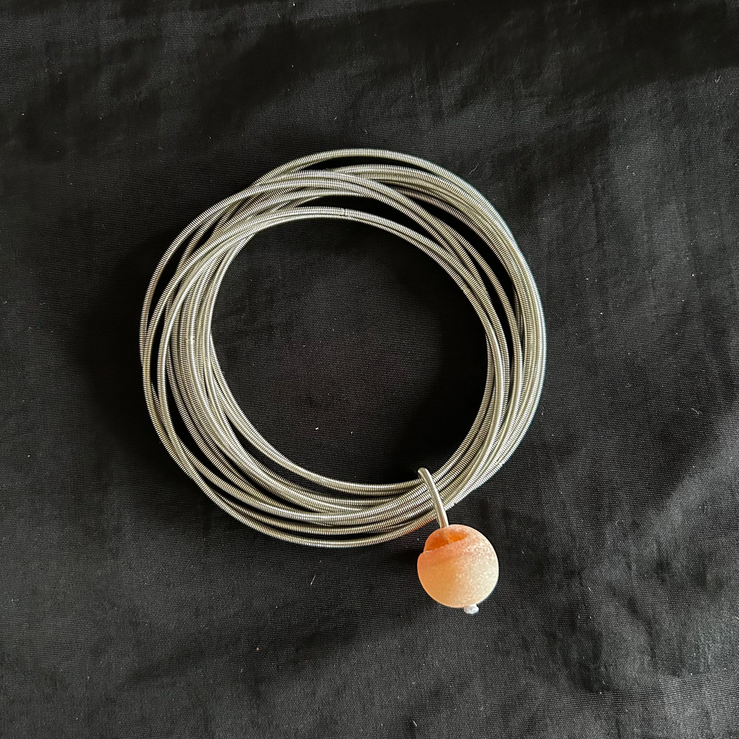 SL-Silver Corded Bracelet with a White Bead