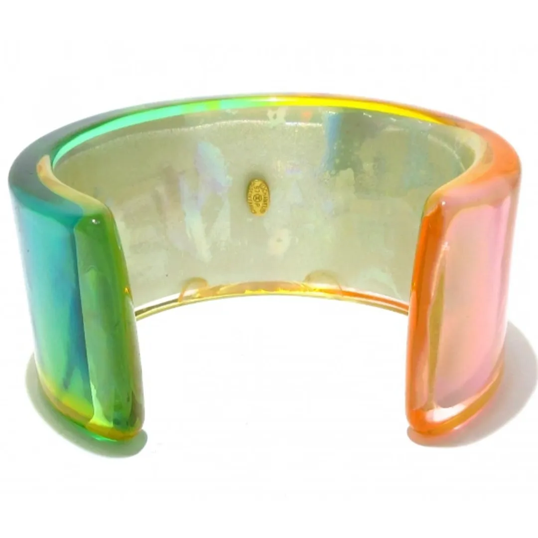 Vintage Chanel plastic aurora resin cuff link bangle/ bracelet with golden logo. Must have gorgeous jewelry. 060904br