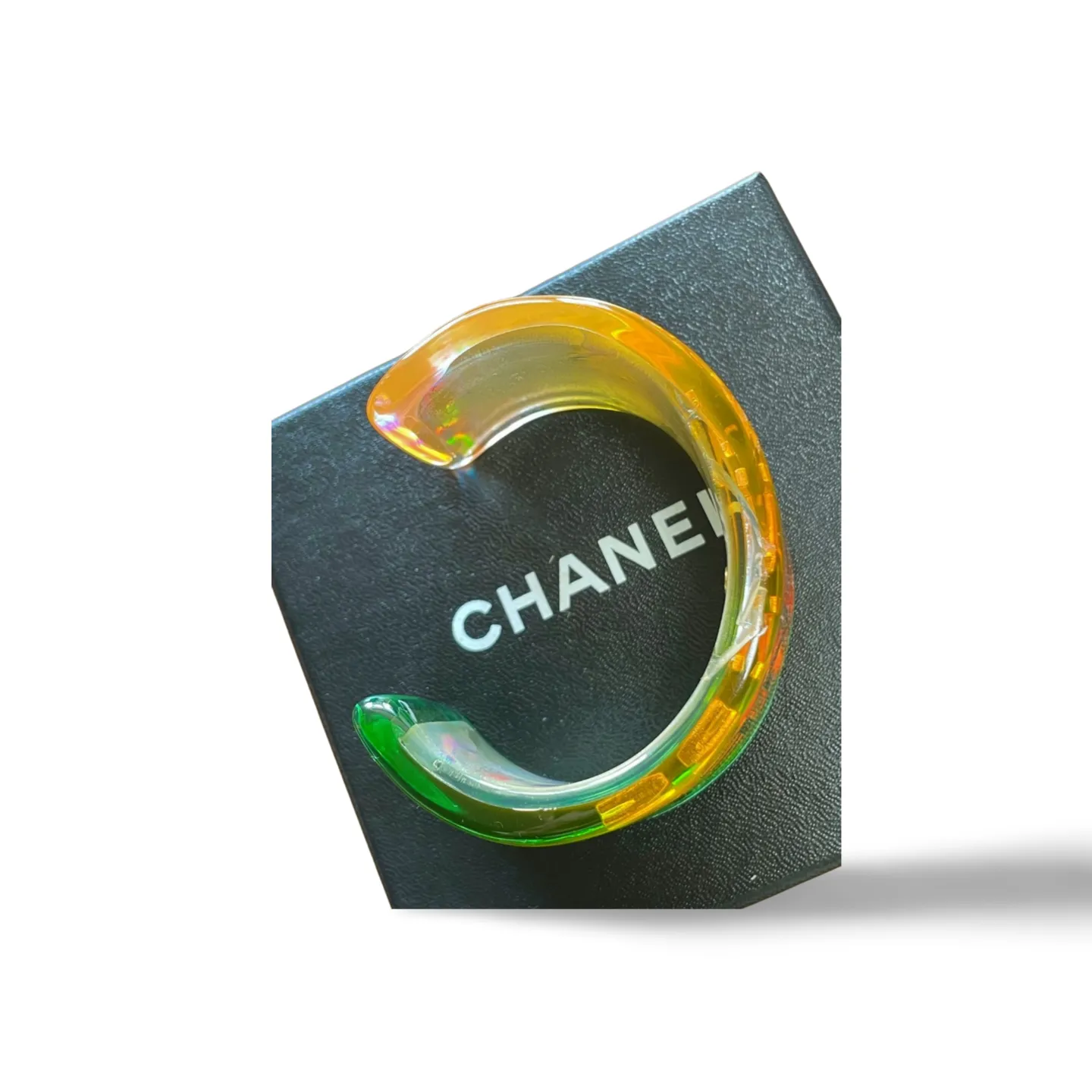 Vintage Chanel plastic aurora resin cuff link bangle/ bracelet with golden logo. Must have gorgeous jewelry. 060904br