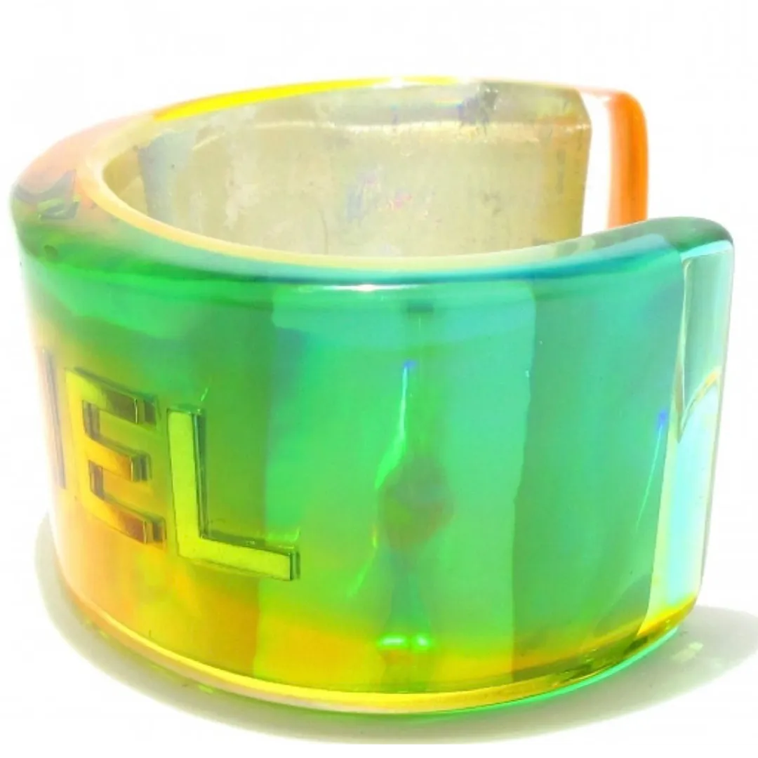 Vintage Chanel plastic aurora resin cuff link bangle/ bracelet with golden logo. Must have gorgeous jewelry. 060904br